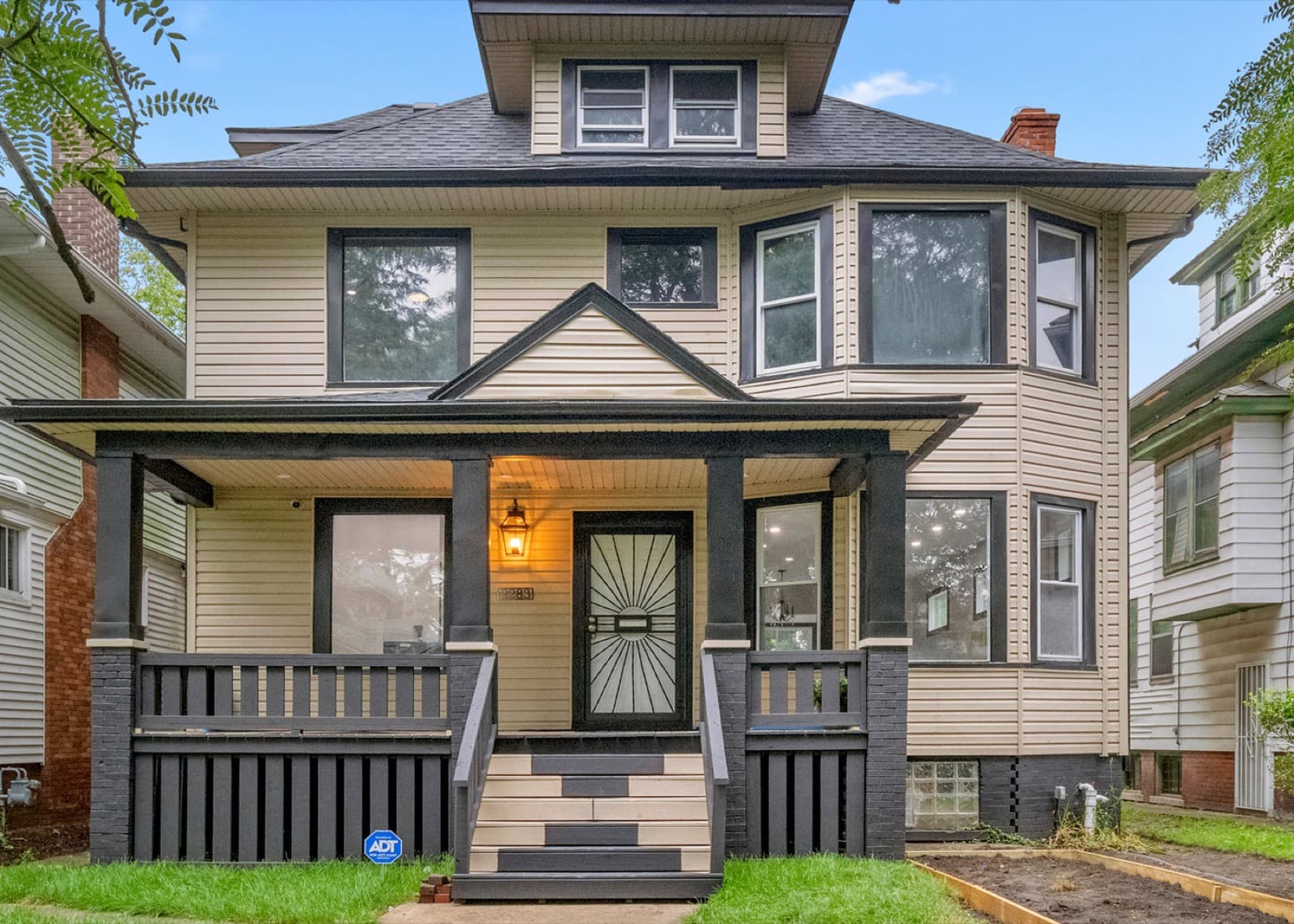 Renovated two-story house with a covered front porch
